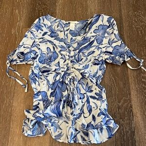 H&M floral top. Size 0. Ruching on front. Ties on sleeves. Never worn!
